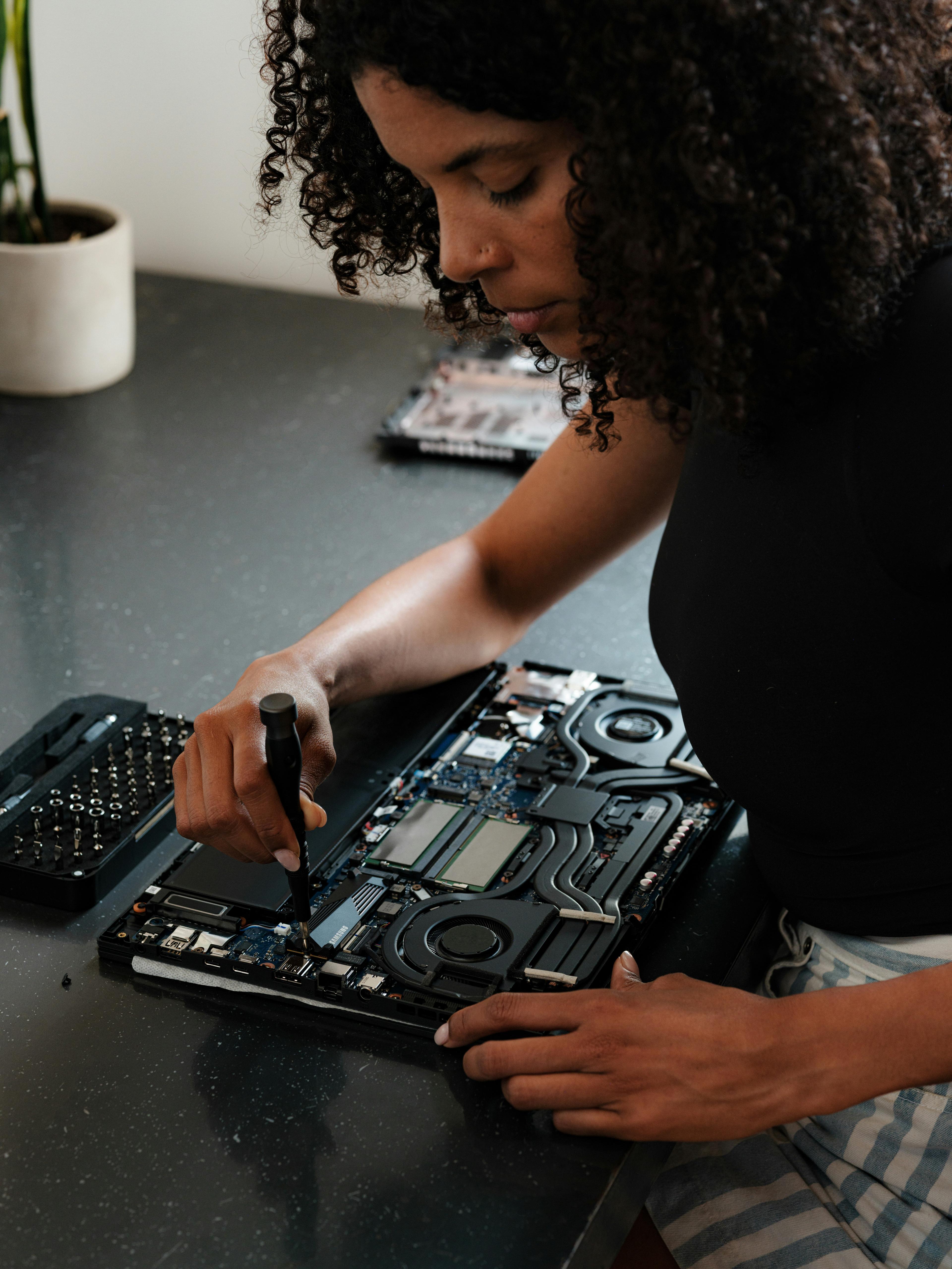 engineer fixing a computer